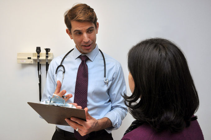 A doctor talks to a patient.